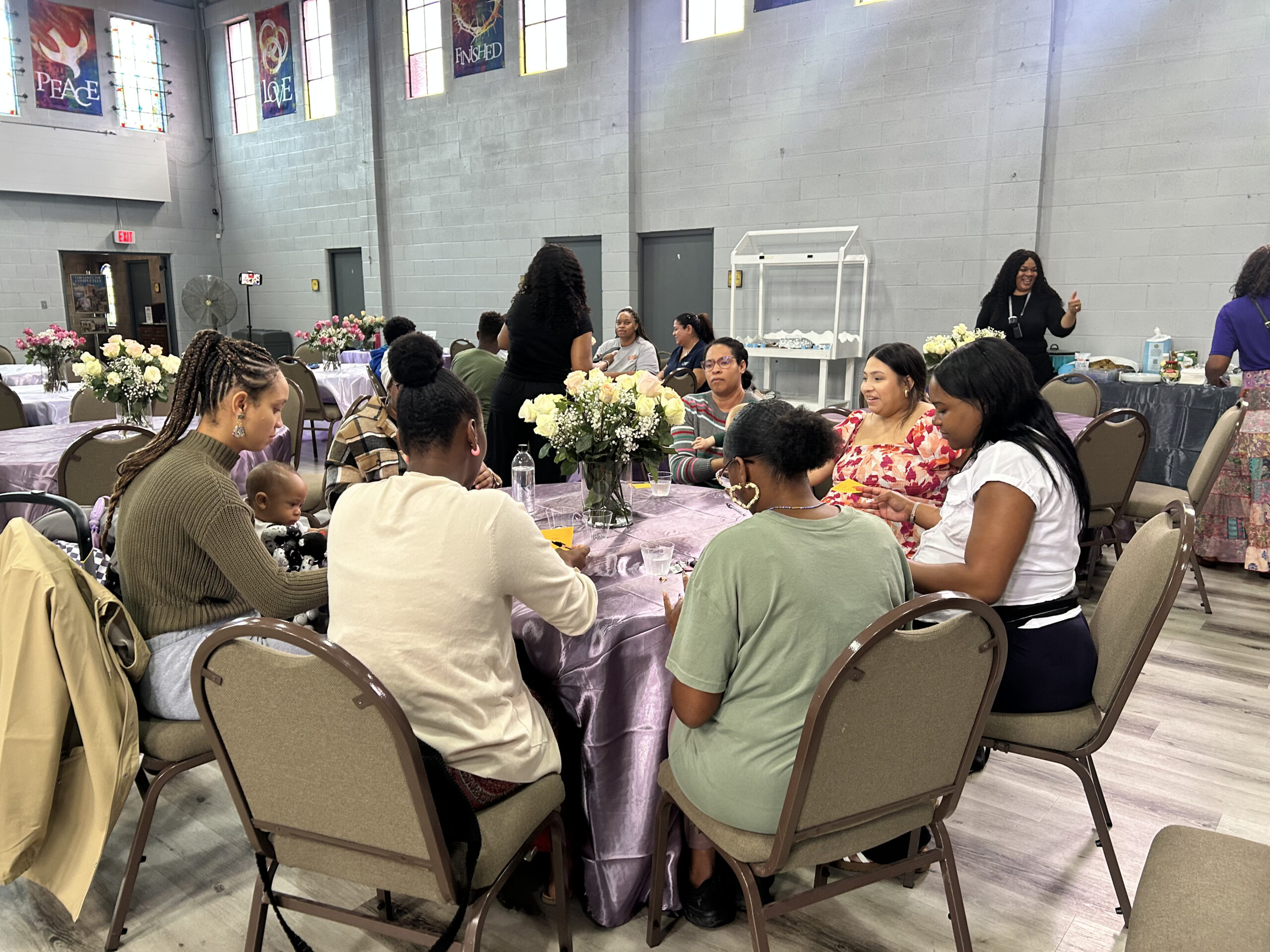 Mothers connecting during a Radiant Mom Academy gathering