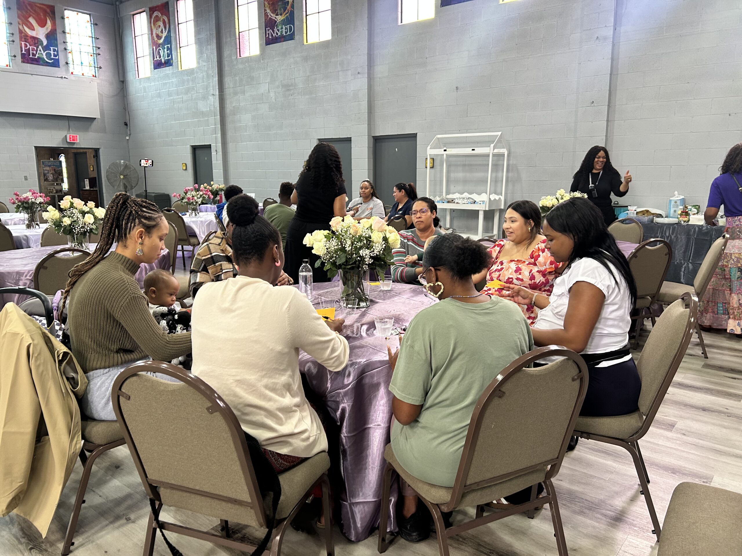 Mothers connecting during a Radiant Mom Academy community gathering